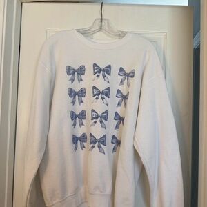 White Sweatshirt with Blue Bow Print